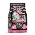 The front of a 12 ounce bag of Bones Coffee Company Cherry Ice Cream coffee. Its flavor is cherry ice cream, and it has a skeleton in an ice cream truck holding out a cone of cherry ice cream and coffee on the art.